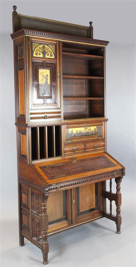 A Gillows Aesthetic Movement walnut, parcel gilt and thuya wood secretaire cabinet, c 1880s